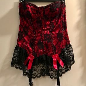 Black lace over red satin corset